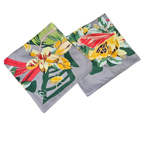 Floral-patterned square silk scarf on a white background