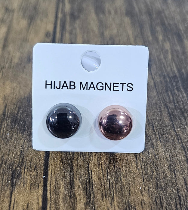 Hijab magnets on a label with a wooden surface background