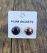Hijab magnets on a label with a wooden surface background
