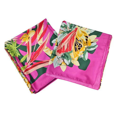 Floral silk scarves with tropical designs on a white background